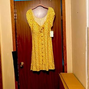 Sun dress with sunflowers all over it 13.00
